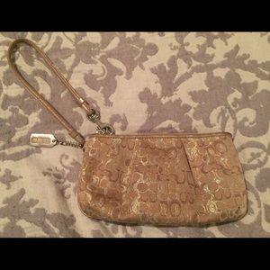 Metallic Coach wristlet